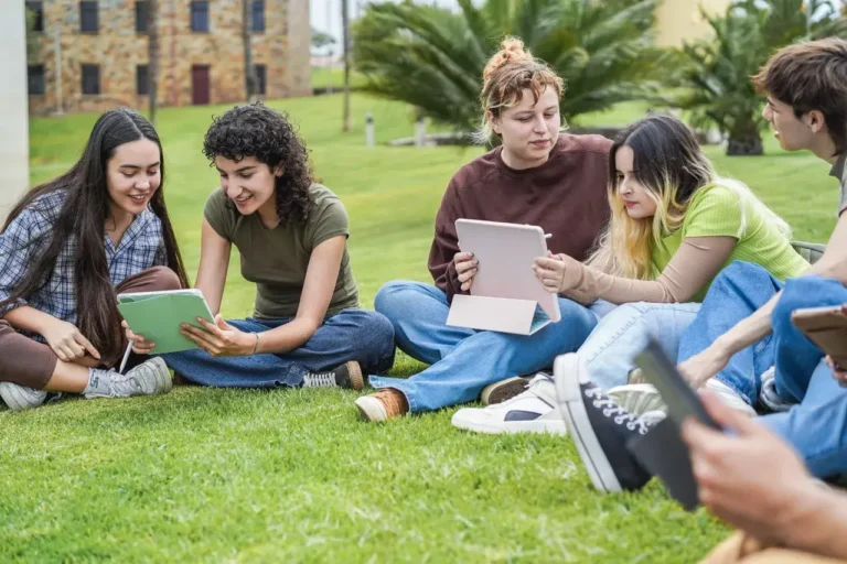 young friends studying together outdoor sitting in 2025 02 21 09 08 49 utc 1 1