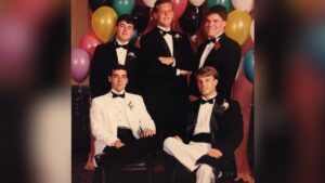 Christopher Parsons (front left, in white tuxedo) with high school friends — the years before the Naval Academy color blind test changed his path
