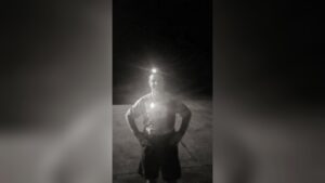 Christopher Parsons running the Palmetto 200 relay at night with a headlamp on a back road in South Carolina