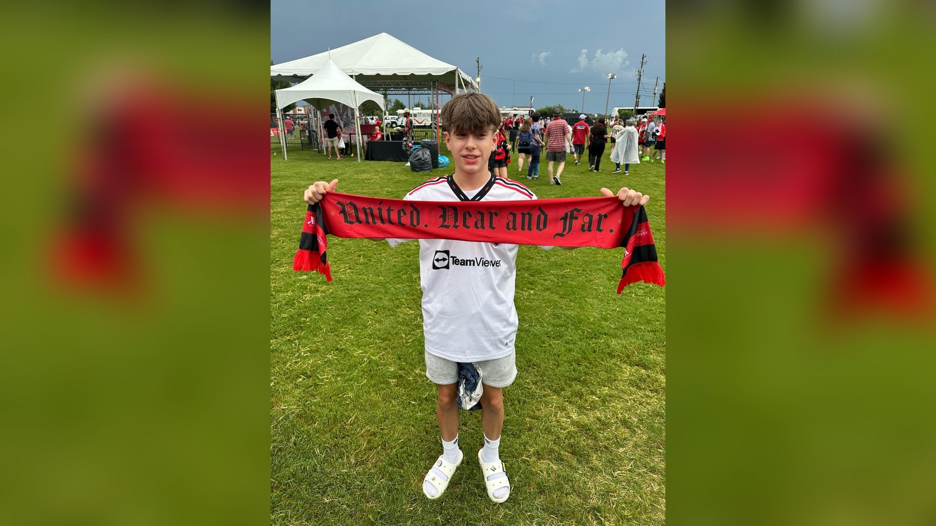 Blog 2 Will Parsons holding a soccer scarf at a 2026 World Cup match — a story about repetition, the wall, and the SAT